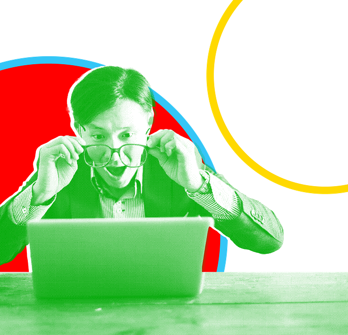 An edited image of a man looking shocked while staring at his laptop.
