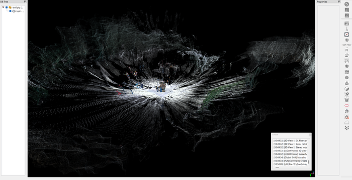 An overhead view of the final 3D point cloud, showing the troll statue and the surrounding terrain. This angle confirms the spatial coherence of the multi-view reconstruction.