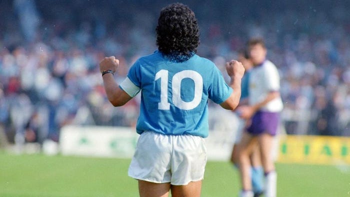 Diego Maradona celebrating with Napoli