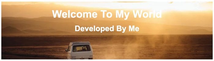 Picture of a car driving through the desert under the words “Welcome to my world”
