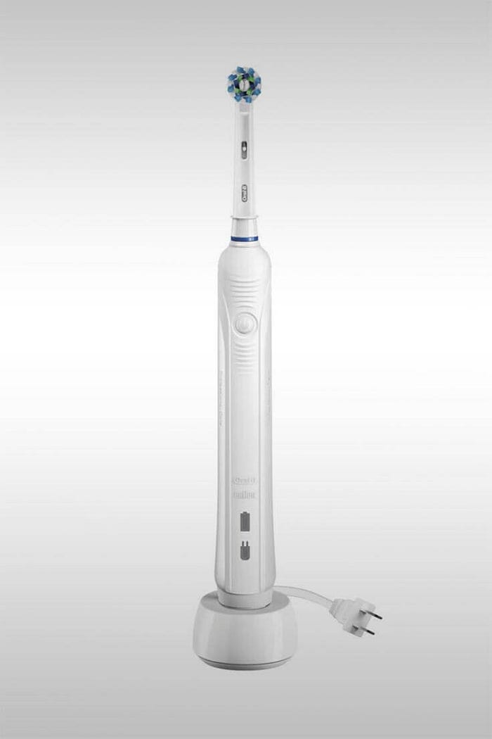 White Pro 1000 Electric Toothbrush (069055859636) — Image Credit: Oral-B