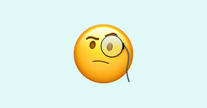 Emoji of a thinking face with a spectacle.