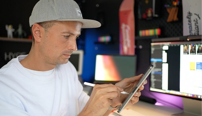 Michal Malewicz sketching on an iPad