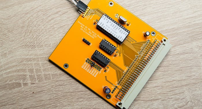 Photograph of a simple printed circuit board with yellow solder mask.