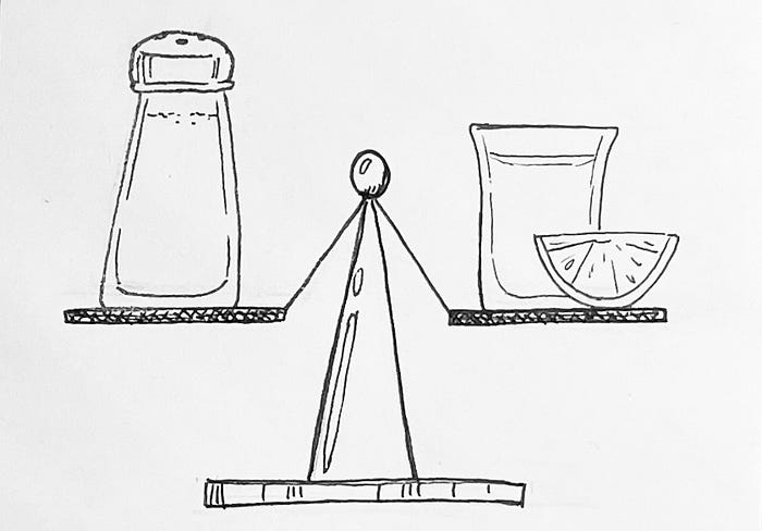 A drawing of a scale balancing a shaker of salt with a shot of tequila and a slice of lime.