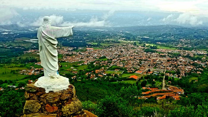 The view of the town from on top of a hill.