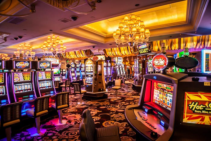 Inside of a casino, with all the poker machines