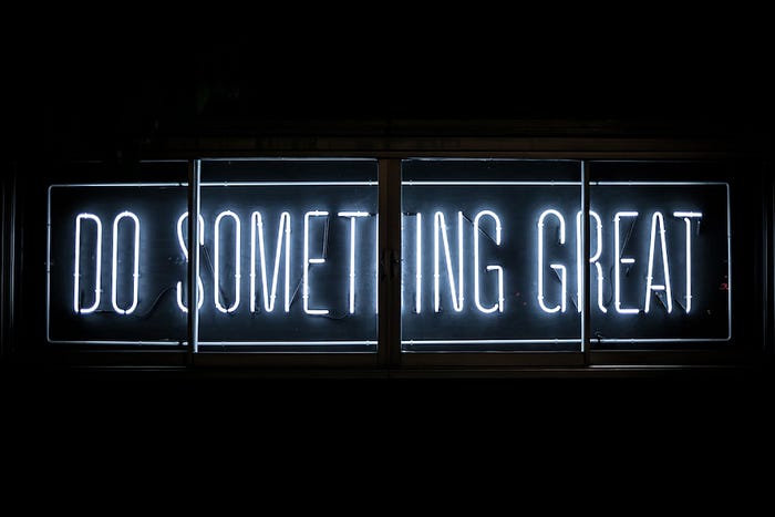 Neon Sign displaying text reading: Do Something Great
