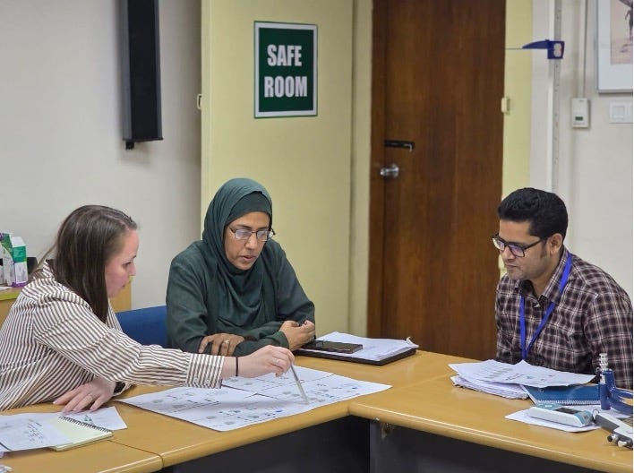 Casey Johanns from Variant Bio (L) with project co-principal investigator Dr. Syeda Momena Afsana, and the project’s medical technologist, Rakibul Islam, during a sample workflow training session. Photo credit: Dr. Tarikul Islam