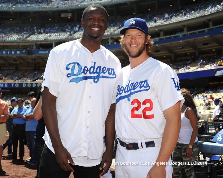 Busy pregames at Dodger Stadium: Julius Randle, Jesse Tyler Ferguson, Greg  Louganis, Rafer Johnson