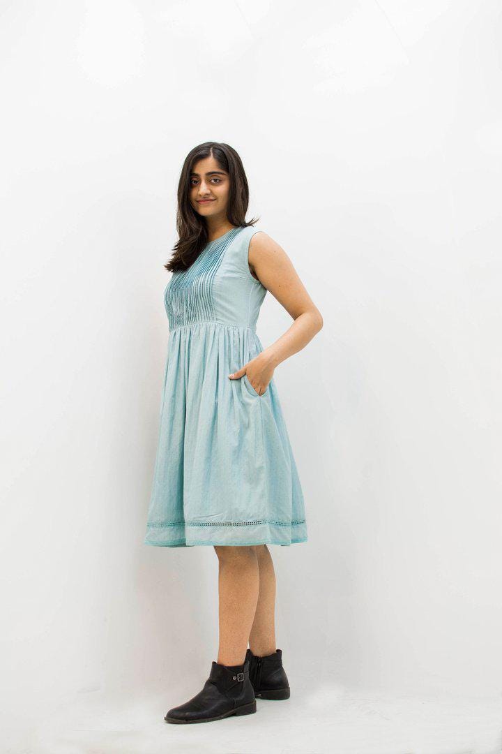 A Dress with pockets on both sides. Midi length dress with fine