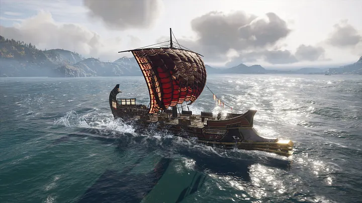 Promotional screenshot of a bireme in Assassin's Creed Odyssey. It is under full sail in the Aegean Sea, implying movement towards the bottom right of the image, its hull kicking up surf, the sun glistening off the water, and wispy clouds in the background.