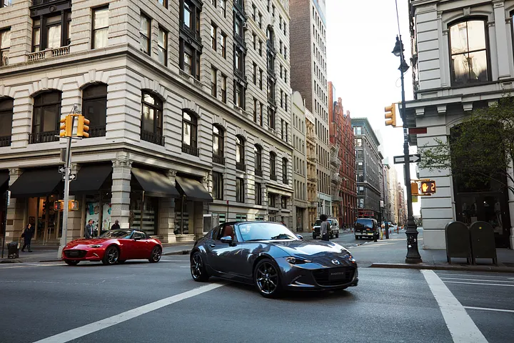 Holding Hands — Mazda, Subaru, and Lotus.