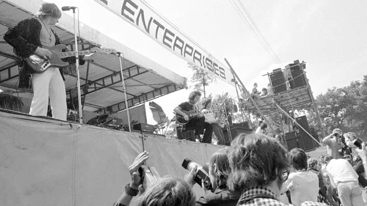 The band on stage in Hyde Park supporting the Rolling Stones.