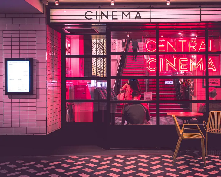 image in pink shade, central cinema sign