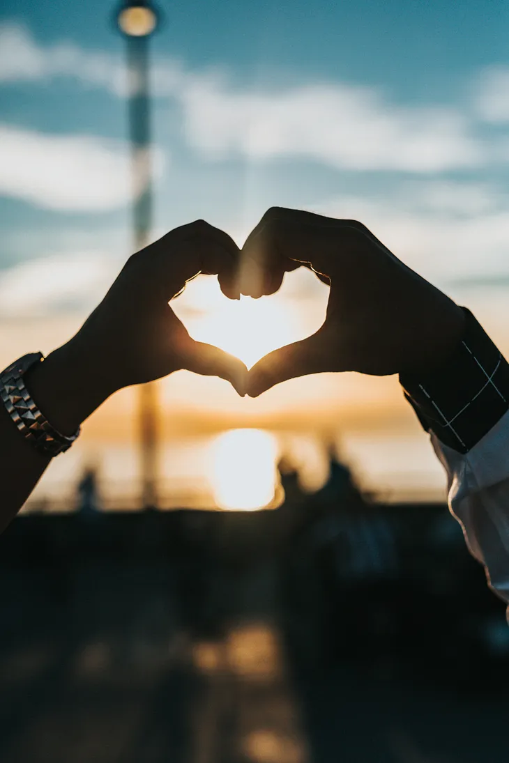 hands forming heart shape