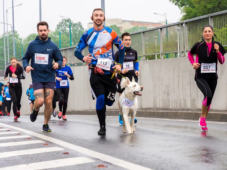 The Athletes running on the road