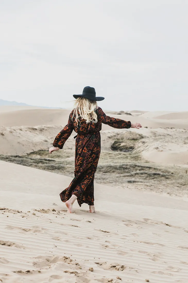 A woman enjoying a beach