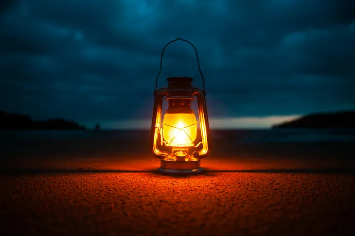 A lone lantern glows against the darkening sky, casting light on the ground. The lantern’s light helps us to observe things around it. This light that makes help us to notice things mirrors the poem’s theme of uncovering hidden emotions and truths.