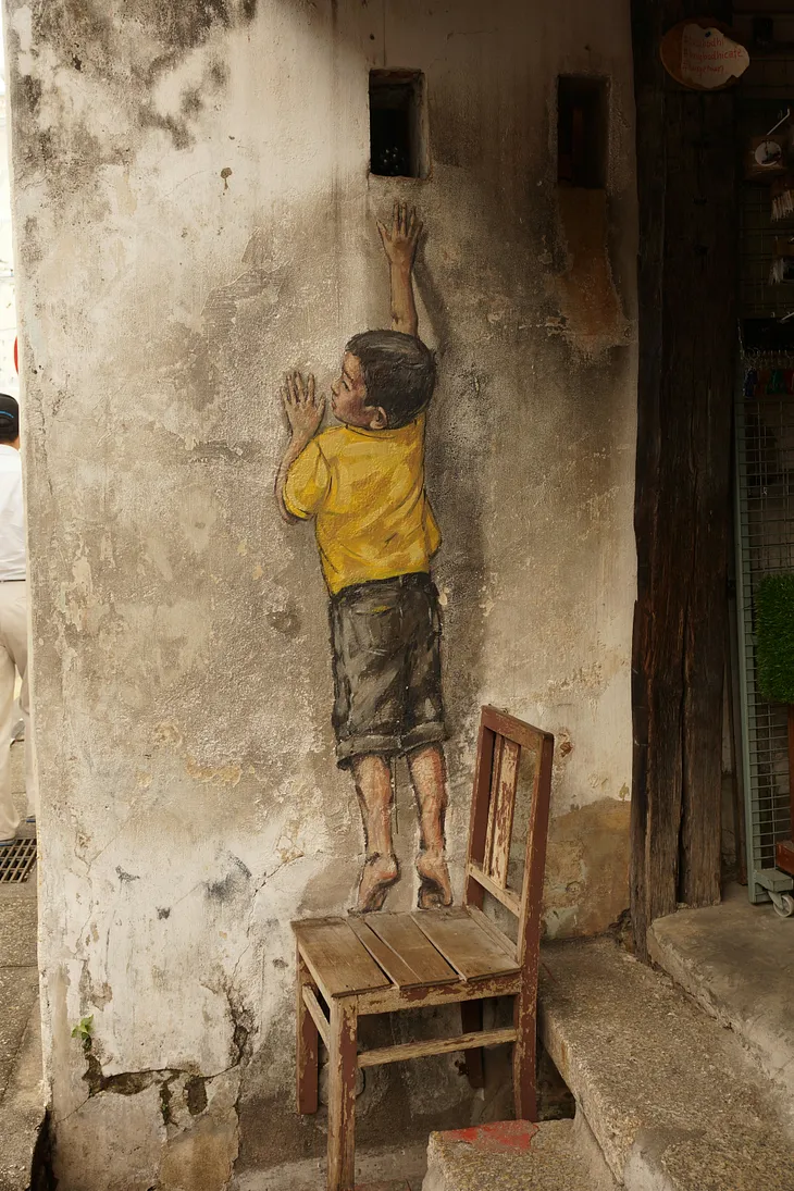 A tromp l’ oeil of a boy on a chair