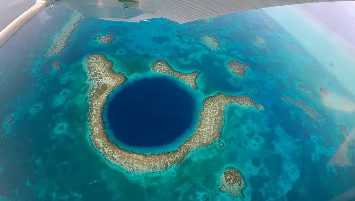 Exploring The Great Blue Hole’s Magnificence from Above and Below