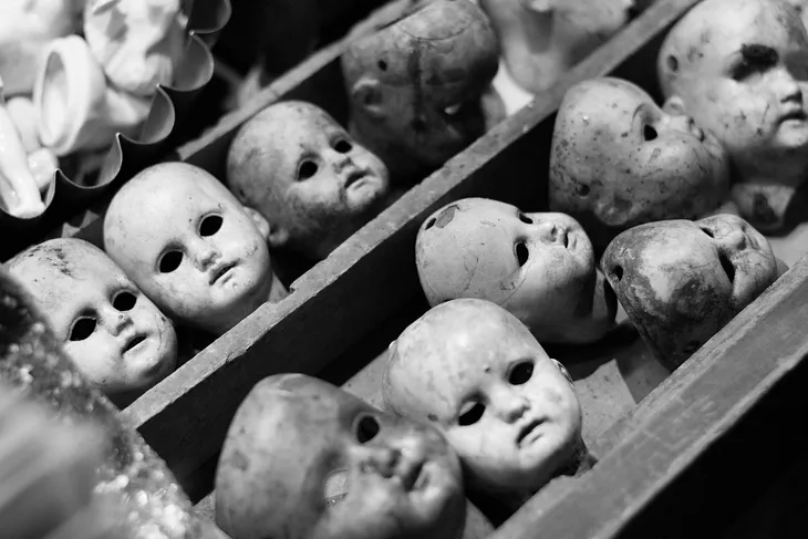 creepy doll heads