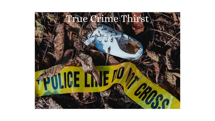 police crime scene yellow tape and a shoe half buried in leaves