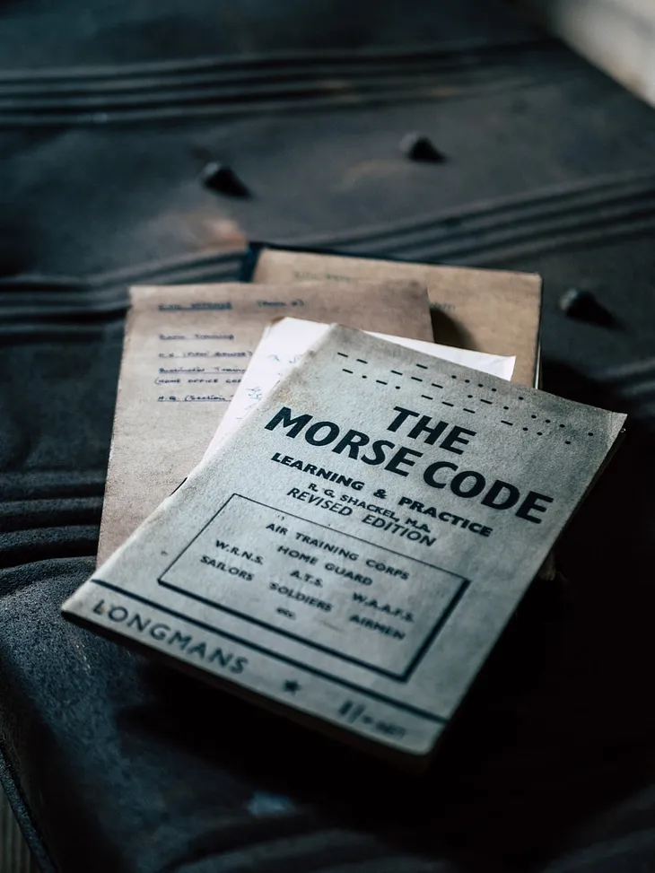 Picture of a Morse code manual indicating the value of learning Morse code