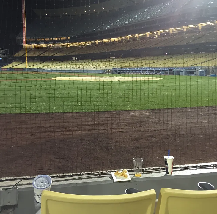 Scott Van Slyke's broken bat landed right in front of this seat Friday night.