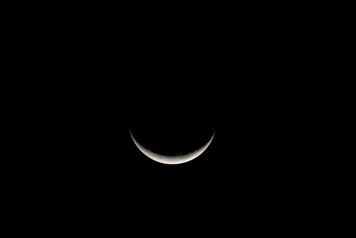 Beautiful crescent moon and a dark sky