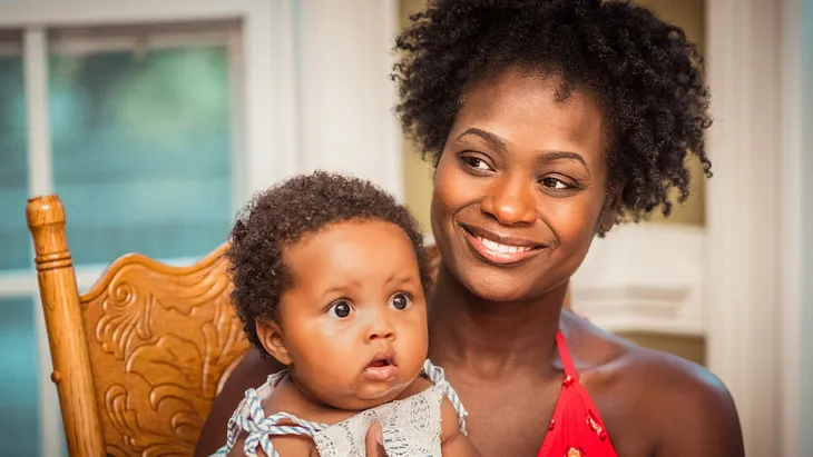 Black mother and baby