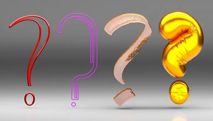 One gold question mark in a row of question marks