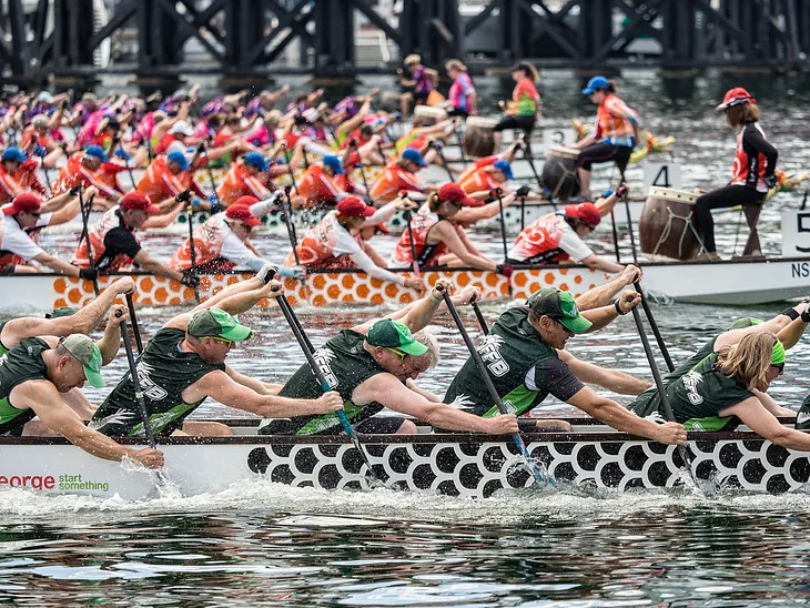 This photo of the dragon boat races was taken in Darling Harbour, Sydney on a blistering hot day.