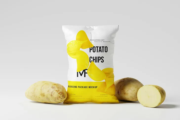 generic bag of potato chips surrounded by uncooked pototoes