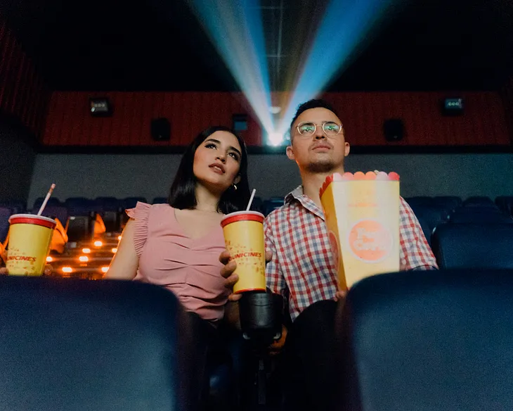 A couple at a movie theatre on Valentine’s