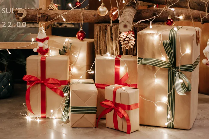 Wrapping Christmas gifts — the easy way to give presence to your presents.