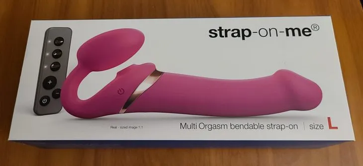 Front of Box of Strap-On-Me Multi Orgasm Bendable Strap-On showing toy and remote.