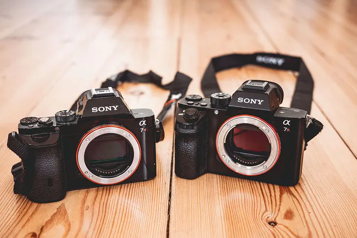 Sony A7R and A7RII on wooden background