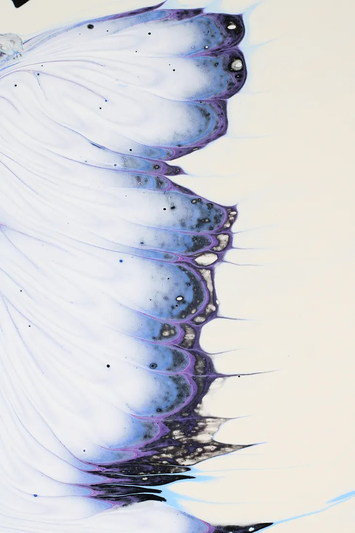 water art painting resembling a butterfly’s wing