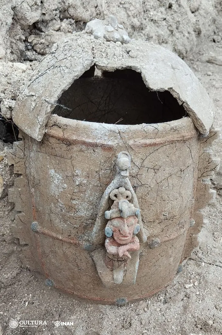 Maize god funerary urn discovered during rescue excavations