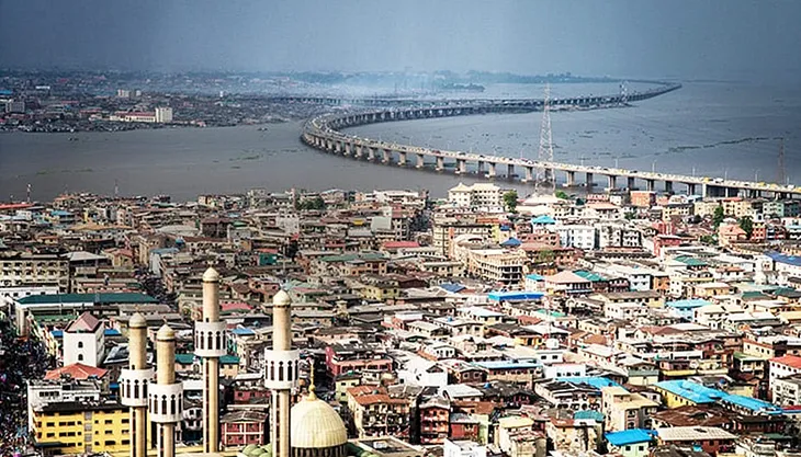 A sky view of the city of Lagos, Nigeria. Overlooking the costal lines of the Lagos Island and third mainland bridge dividing the Mainland and the Island.