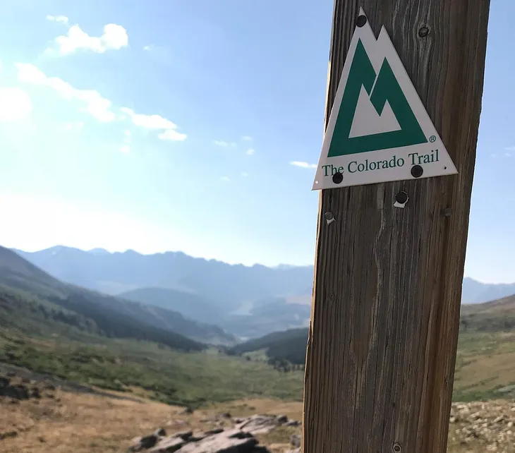 A Colorado Trail blaze, near the summit of Searle Pass. Image credit: Quentin Septer