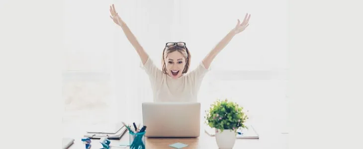 Woman happy while building her brand online