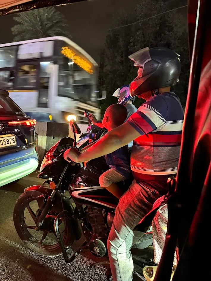 A family of 4 on a motorcycle