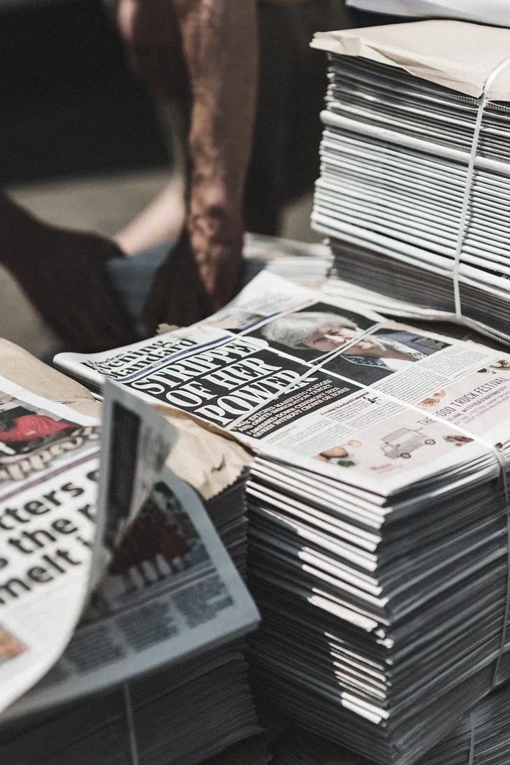 A stack of bound up newspapers.