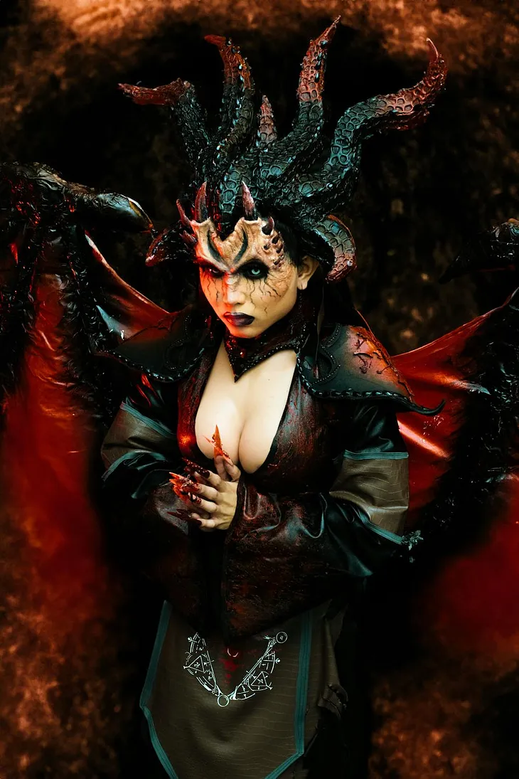 Woman Wearing a Devil Costume with Horns