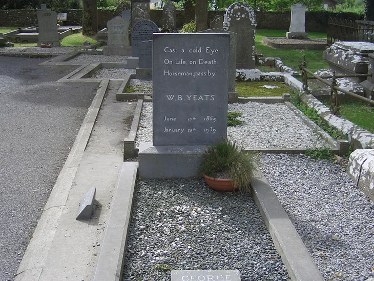 W. B. Yeats’ gravestone, Drumcliff Church, Sligo Ireland. Text reads: Cast a cold Eye On Life, on Death. Horseman pass by.