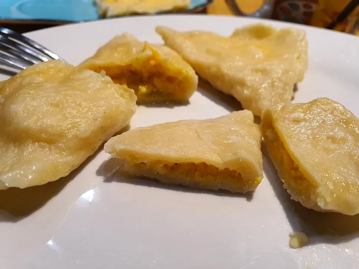 Portions of ravioli in a plate.