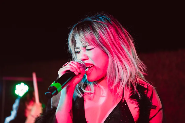 female singer on concert stage