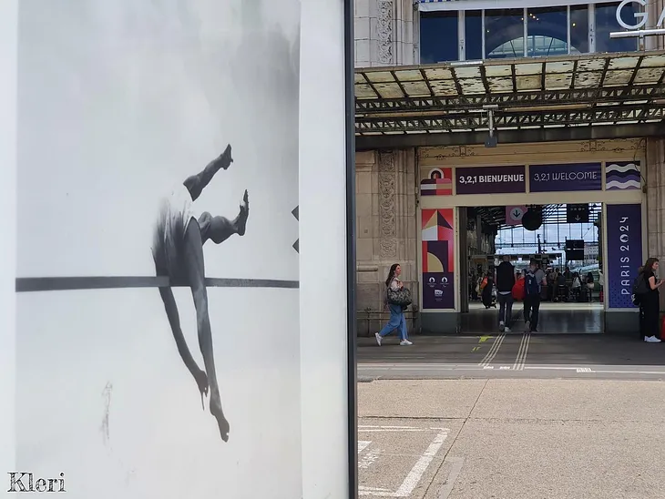 Sport photograph on the left, Gare de Lyon entrance on the right.